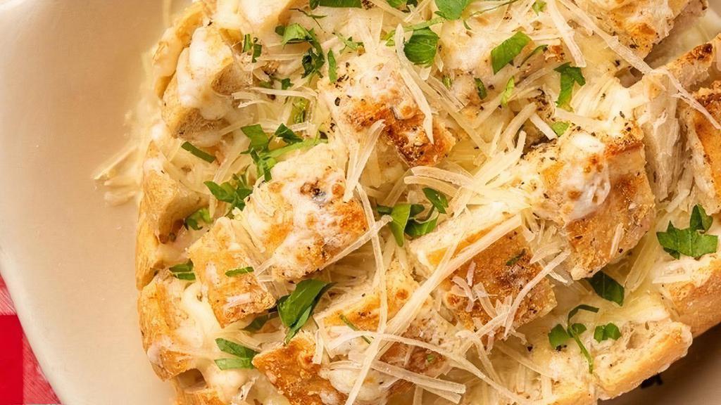 Garlic Bread · White Truffle Ricotta Butter & Italian Cheese