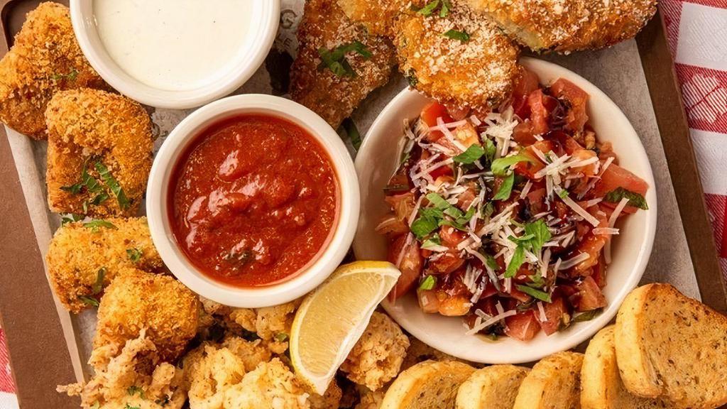 Bombalina · A sampler of our Chef's four favorite starters. Includes, Crispy Zucchini Fritte, Mini Mozzarella Marinara, Classic Tomato Bruschetta and Calamari.