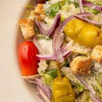 Italian Tossed Salad · Iceberg, Arugula, Kalamata Olives, Red Onions, Pepperoncini, Italian Cheese Blend, Garlic Cr...