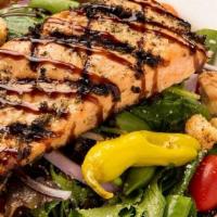 Grilled Salmon Salad · Mixed Greens, Grape Tomatoes, Red Onions, Sugar Snap Peas, Garlic Croutons, White Balsamic V...