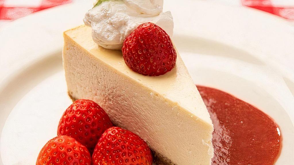 New York Style Cheesecake · Fresh Strawberries