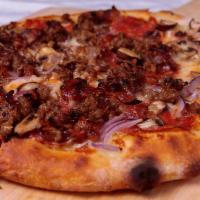 Carni · Spicy calabrese salami, sausage, mushrooms, red onions, smokey bacon, Mozzarella.