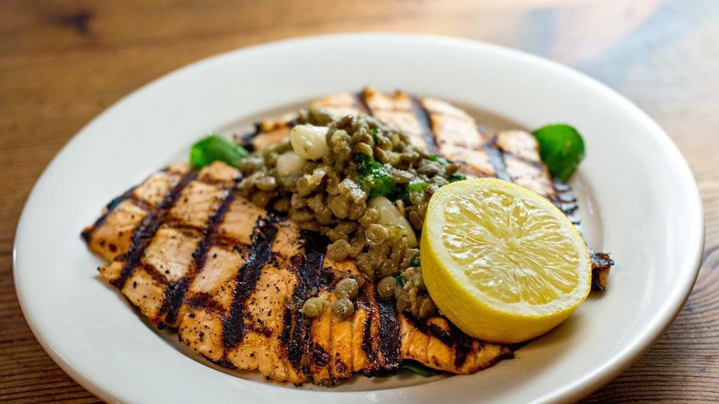 Salmon · Grilled salmon topped with lemon-caper sauce.