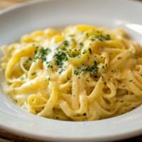 Fettuccini Alfredo · Creamy white sauce with aged Parmesan cheese.