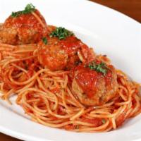 Polpette · Moist tender beef and pork meatballs with arabiatta tomato sauce over spaghetti.