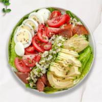 Call A Cobb Salad · Hard boiled egg, bacon, avocado, tomato, and blue cheese with your choice of greens and dres...