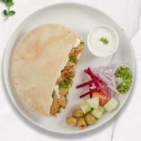 Chunky Shawarma Wrap · Halal. hummus, Lettuce, minced salad, pickles, tahini sauce, chili spread and garlic.