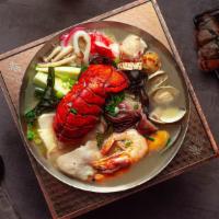 12. Seafood Lobster Hot Soup · Napa, lobster, soft tofu, vermicelli, enoki mushroom seaweed knot, brown beech mushroom, zuc...