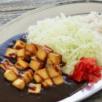 Tofu Curry (V) · Flash-fried tofu with katsu sauce served with shredded cabbage, Fukujin-pickles and 50% mill...