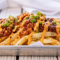 Fujiyama Fries · French fries topped with soboro, spicy miso beef, and garlic bacon. Drizzled with our house ...