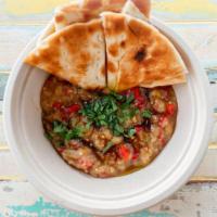 Baba Ganoush with Warm Pita · Eggplant dip made from roasted eggplant, red bell peppers, pomegranate molasses and warm pit...