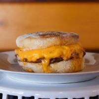 Sausage Breakfast Sandwich · Pork Sausage Patty, Egg, Cheddar Cheese & House-made Chipotle Aioli on an English Muffin