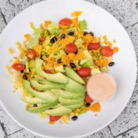 Stacy's Mexican Salad · Romaine lettuce, cherry tomatoes, corn, black beans, cheddar, avocado, and cheese tortilla c...