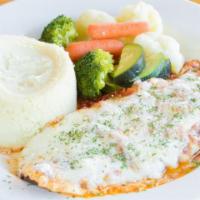 Chicken Parmigiana · Breaded and baked in tomato sauce topped with mozzarella. Served with breadsticks and your c...