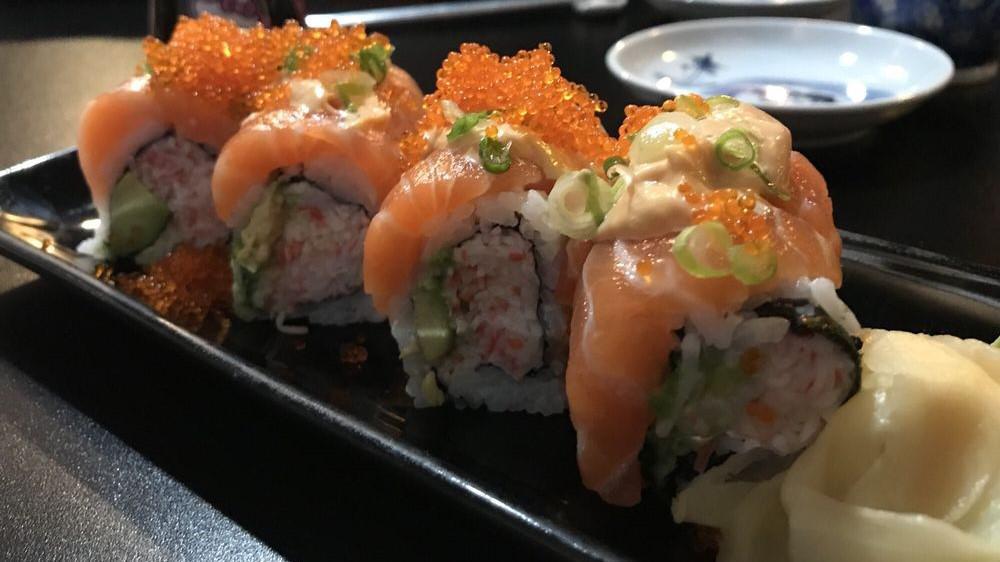 Tesla Roll · California Roll with Salmon on top with Spicy Mayonnaise, Green Onion and Topeka on top