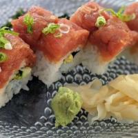 Spicy Tuna · Spicy tuna with cucumber and avocado topped with green onion.