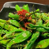 Shishito Pepper · Lightly fried and tossed in our dashi-based savory soy glaze. 1 in 10 shishito could be extr...