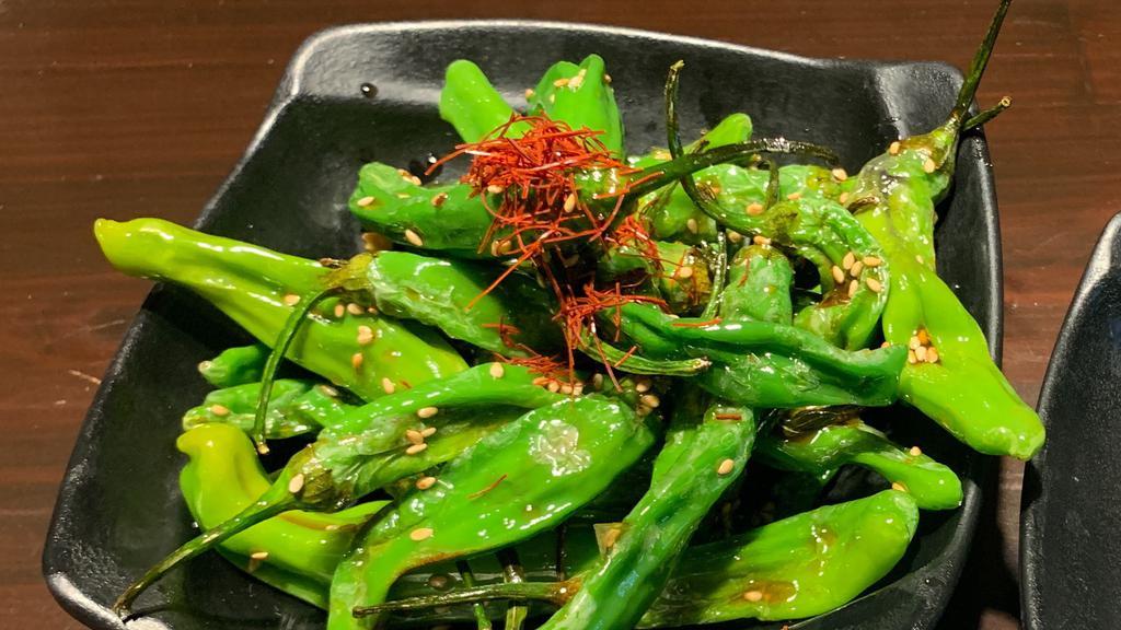 Shishito Pepper · Lightly fried and tossed in our dashi-based savory soy glaze. 1 in 10 shishito could be extra spicy!!