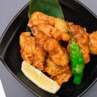 Chicken Karaage · Japanese style savory fried chicken with a hint of black pepper. Served with matcha salt.