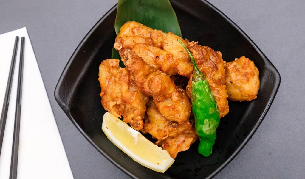 Chicken Karaage · Japanese style savory fried chicken with a hint of black pepper. Served with matcha salt.