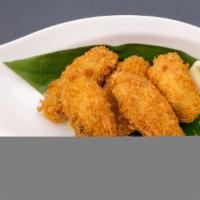 Fried Oysters (5 pcs) · Panko fried juicy oysters from Hiroshima, Japan. Served with okonomi sauce.
