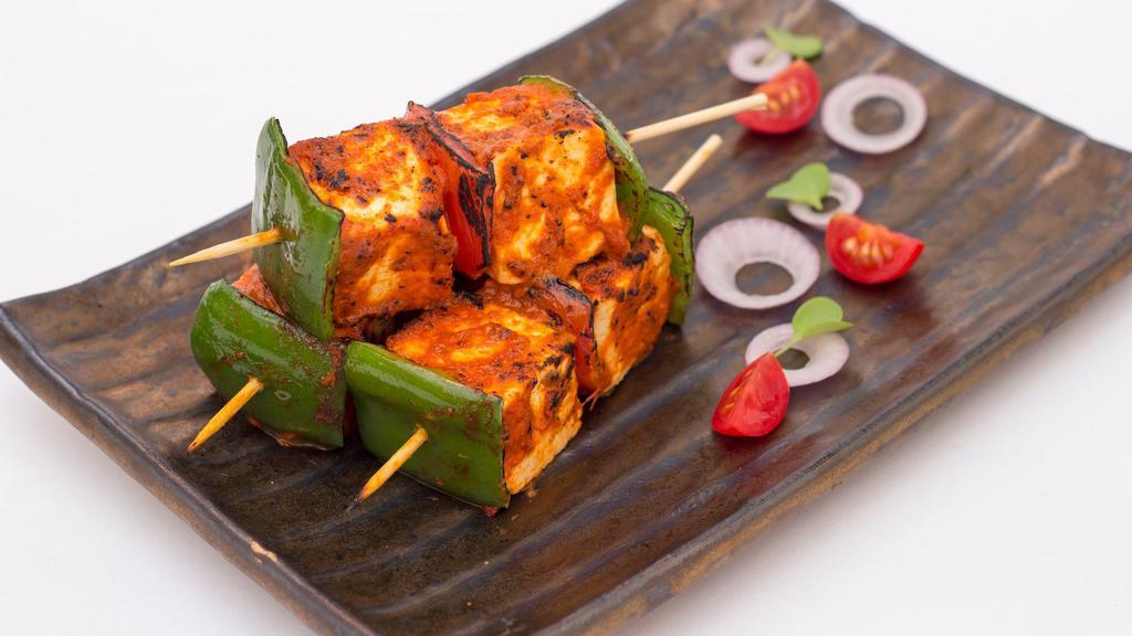 Harippa Paneer Tikka · Cottage cheese in a blend of chilli and spices, cooked in tandoor.