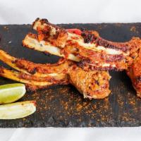 Tandoor Lamb Chops · Lamb chops succulent, spiced, marinated for hours before cooking in a tandoori oven.