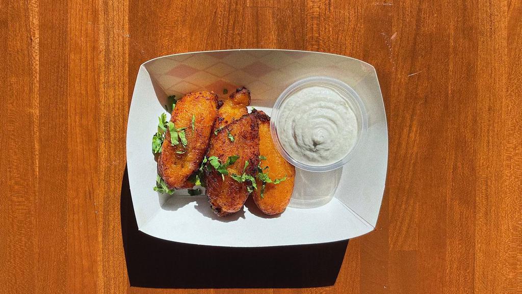 Platanos · Fried plantains with side of coconut ranch. Vegan + gluten free