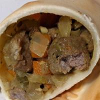 4. Cordero · Halal lamb, olive oil, garlic, ginger, onion, jalapeño, cumin, curry, carrot, mint, & spices.