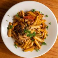 El Hornito's Signature Pasta · Penne with chipotle creamy sauce, hotlinks, bell pepper, mushrooms, garlic, red onions, crus...