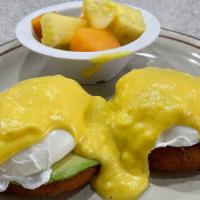 Crab Cake Benedict · Two crab cakes topped with avocado, poached eggs, and hollandaise sauce. No English muffin.