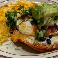 Huevos Rancheros · Three corn tortillas, black beans, two eggs, sour cream,  salsa, tortilla strips and avocado
