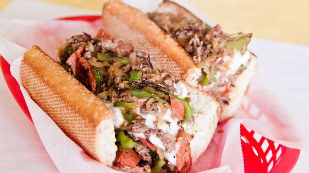 The Dodgers Suck · Cheesesteak, hotlink, grilled onions, bell peppers, and mayo only.