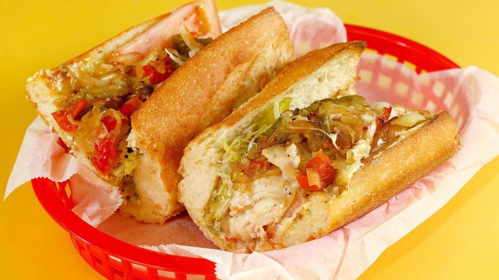 Turkey Breast · Grilled sliced turkey breast, onions, bell peppers, tomato, and cheese.