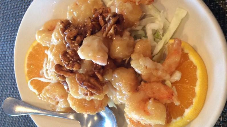 Honey Walnut Prawns · House Favorite! Battered-fried prawns smothered in a creamy white sauce and topped with our candied walnuts.