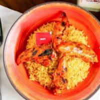 *Chicken & Rice Bowl · Porto's Peri Peri favorite: 4 juicy flame-grilled peri chicken tenders with our signature Po...
