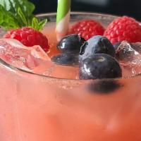 Summer Breeze · OJ, cranberry juice and fresh berries