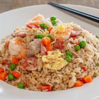 House FR · House Fried Rice
Includes BBQ pork, chicken, and shrimp.