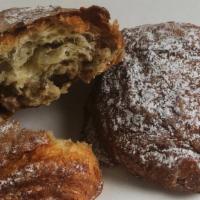 Chocholate Hazelnut Croissant · A rich, butter croissant filled with sweet chocolate and hazelnut.