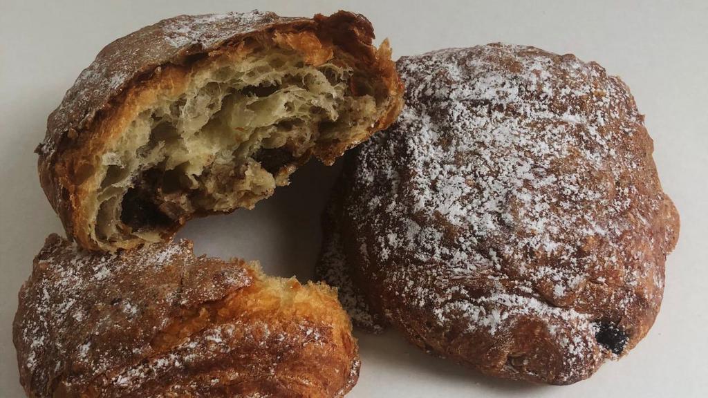 Chocholate Hazelnut Croissant · A rich, butter croissant filled with sweet chocolate and hazelnut.