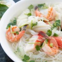 #40. Seafood Combo with Rice Noodle · Jumbo shrimp, imitated crabmeat, squid, fish ball & fish tofu cake