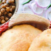 Chole Bhature · Chole Bhature is one of the mouth-watering, spicy, exotic dish from Punjabi Cuisine. The cri...