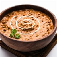 Dal Makhani · 12oz Black Lentils and kidney beans mixed with tomato gravy and special blend of masala.