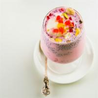 Falooda · Rose milk mixed with vermicelli, tutti frutti and topped with ice cream
