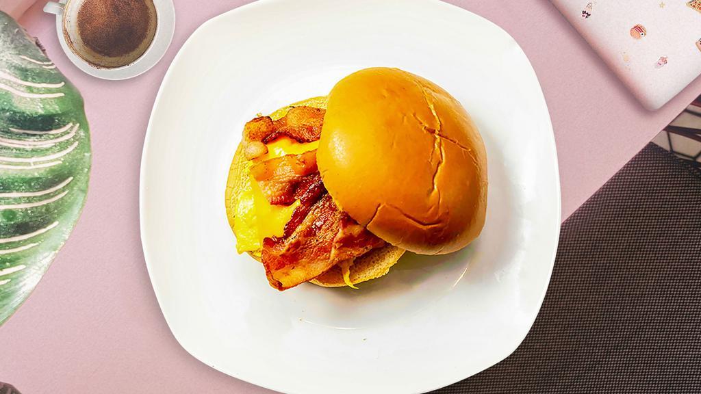 Back To Bacon Breakfast Sandwich  · Scrambled egg, bacon, and cheddar cheese on your choice of bread.
