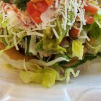 (1) Sope with rice and beans · 1 Sope with rice and beans. Sope is made of corn topped with beans, lettuce, sour cream,  gu...