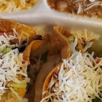 Three Tacos with rice and beans · Served with rice & beans