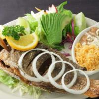 Traditional Deep Fried Fish · Rice, beans , side salad & choice of tortillas