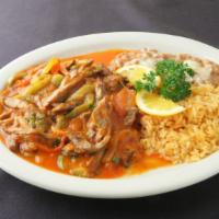 Steak Ranchero with rice and beans · Served with rice, beans and flour or corn tortillas.