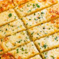 Ultimate Cheese Bread · French bread topped with two cheeses, spinach, chives, and margarine or butter.